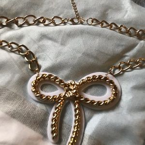 Gold bow necklace